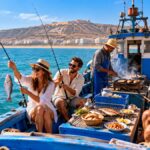 Tourists fishing on a boat trip in Agadir bay